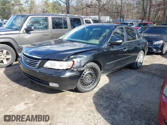 2009 Hyundai Azera Limited z VIN KMHFC46F59A428900, wystawiony jako IAAI lot #41234438 z przebiegiem 258 219 mil mil oraz . Historia ofert i sprzedaży dostępna na DreamBid. Obrazek 2.