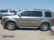 2009 Honda Pilot Touring with VIN 5FNYF38809B004142, listed as a IAAI auction lot 42337103 with 152,874 mi miles and . Bid and sale history available at DreamBid. Image 14.