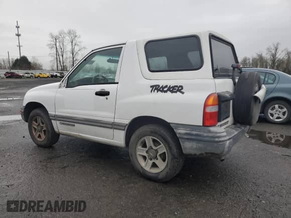 2002 Chevrolet Tracker with VIN 2CNBE18CX26926779, listed as a Copart auction lot 86788864 with 172,966 mi miles and Salvage title. Bid and sale history available at DreamBid. Image 2.