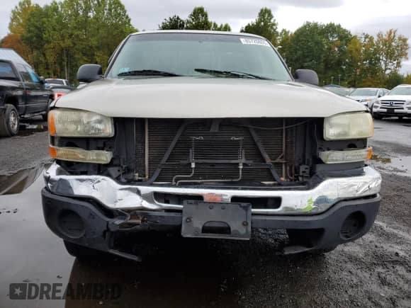2006 GMC Sierra 1500 SLE z VIN 1GTEK14T76Z100496, wystawiony jako Copart lot #85720805 z przebiegiem Nie podano mil oraz Szkoda całkowita • Salvage title. Historia ofert i sprzedaży dostępna na DreamBid. Obrazek 5.