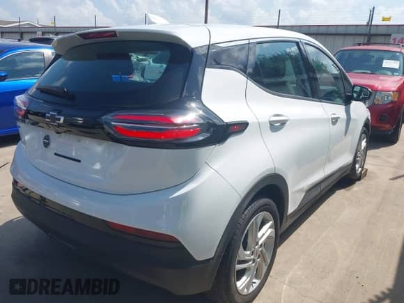 2023 Chevrolet Bolt EV 1LT with VIN 1G1FW6S02P4206456, listed as a IAAI auction lot 42494716 with 14,684 mi miles and . Bid and sale history available at DreamBid. Image 4.
