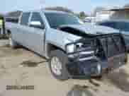 2016 Chevrolet Silverado 1500 LT with VIN 1GCUKREC9GF229979, listed as a IAAI auction lot 41859015 with 110,821 mi miles and . Bid and sale history available at DreamBid. Image 1.