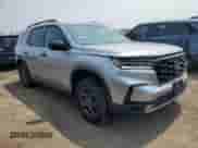 2025 Honda Pilot TrailSport with VIN 5FNYG1H61SB108032, listed as a Copart auction lot 66151355 with 3,935 mi miles and Salvage title. Bid and sale history available at DreamBid. Image 4.