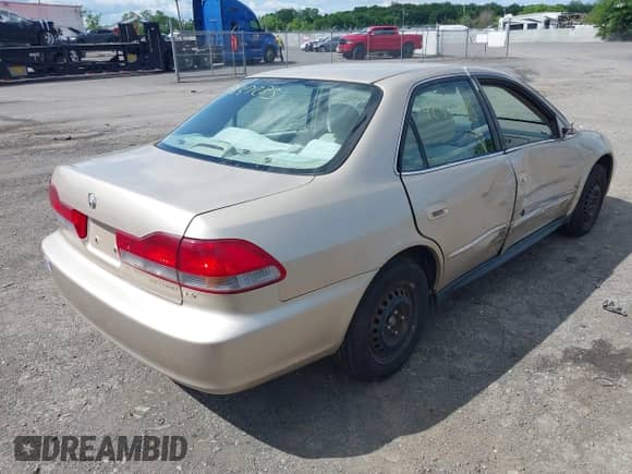 2001 Honda Accord LX with VIN 1HGCG66511A004764, listed as a IAAI auction lot 42337285 with 188,189 mi miles and . Bid and sale history available at DreamBid. Image 4.