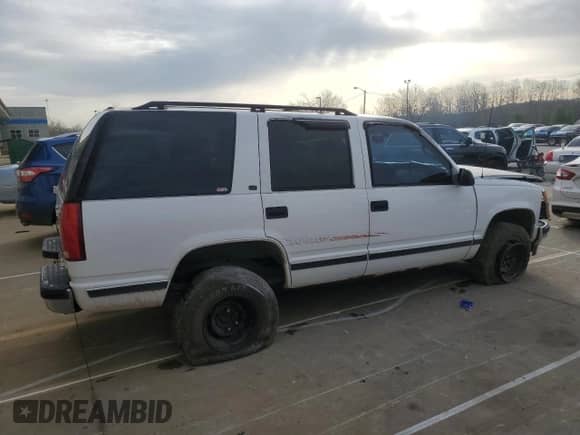 1998 Chevrolet Tahoe с VIN 1GNEK13R7WJ340188, выставлен на аукционе Copart как лот 52177815 с пробегом 217 850 миль миль и Списание • Salvage title. История ставок и продаж доступна на DreamBid. Изображение 3.