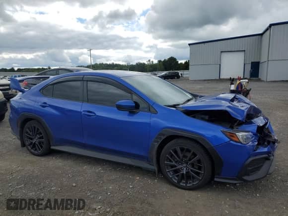 2023 Subaru WRX Premium with VIN JF1VBAF67P9801876, listed as a Copart auction lot 70974925 with 45,302 mi miles and Salvage title. Bid and sale history available at DreamBid. Image 4.