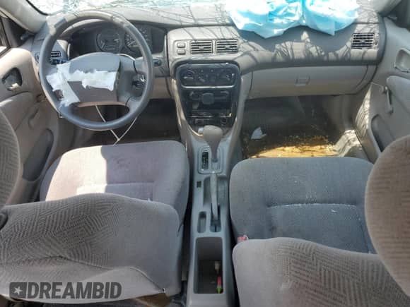 2002 Chevrolet Prizm с VIN 1Y1SK52822Z410702, выставлен на аукционе Copart как лот 63035825 с пробегом Не указан миль и Списание • Salvage title. История ставок и продаж доступна на DreamBid. Изображение 8.