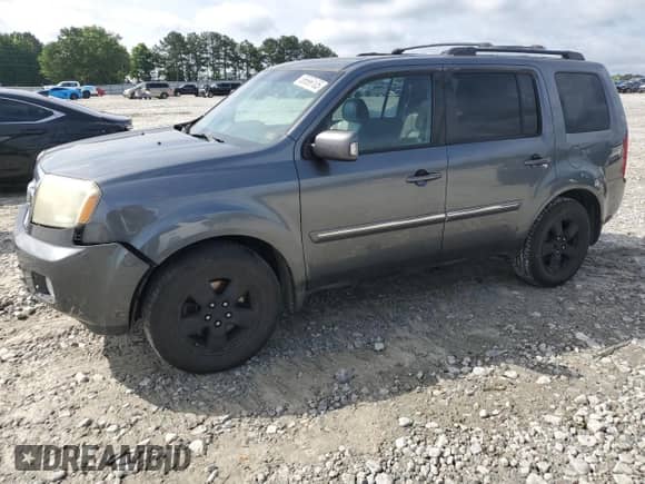 2011 Honda Pilot Touring с VIN 5FNYF3H98BB017185, выставлен на аукционе Copart как лот 68420775 с пробегом 204 719 миль миль и На запчасти • Non repairable. История ставок и продаж доступна на DreamBid. Изображение 1.