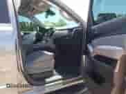 2020 Chevrolet Tahoe LT with VIN 1GNSCBKC3LR204995, listed as a IAAI auction lot 42292566 with 64,874 mi miles and . Bid and sale history available at DreamBid. Image 5.