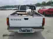 1996 Nissan Frontier XE with VIN 1N6SD16S6TC389626, listed as a Copart auction lot 59312595 with 210,292 mi miles and Salvage title. Bid and sale history available at DreamBid. Image 6.