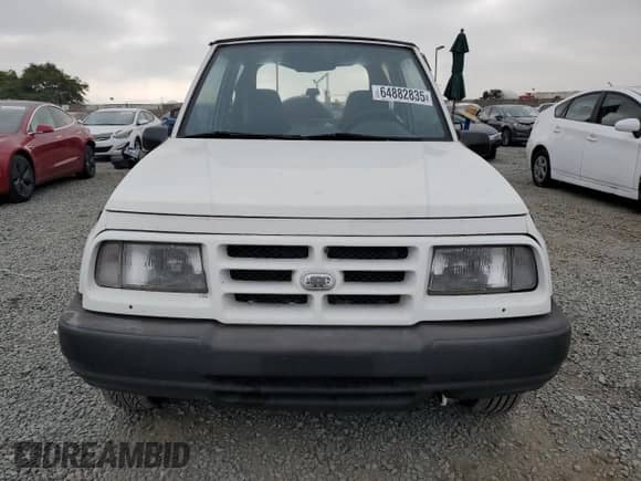 1996 Chevrolet Tracker z VIN 2CNBE1866T6918755, wystawiony jako Copart lot #64882835 z przebiegiem 886 440 mil mil oraz Czysty tytuł • Clean title. Historia ofert i sprzedaży dostępna na DreamBid. Obrazek 5.