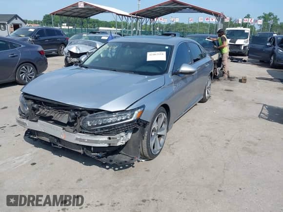 2019 Honda Accord Touring with VIN 1HGCV2F96KA018937, listed as a IAAI auction lot 42462118 with 82,260 mi miles and . Bid and sale history available at DreamBid. Image 2.
