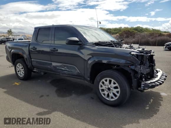 2024 Toyota Tacoma SR with VIN 3TYKD5HN7RT003129, listed as a Copart auction lot 63349125 with 15,244 mi miles and Salvage title. Bid and sale history available at DreamBid. Image 4.