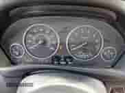 2014 BMW 3 Series 320i with VIN WBA3B1C59EK134700, listed as a Copart auction lot 60987785 with 149,684 mi miles and Salvage title. Bid and sale history available at DreamBid. Image 9.