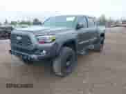 2021 Toyota Tacoma SR with VIN 3TMCZ5AN3MM450562, listed as a IAAI auction lot 43071461 with 15,850 mi miles and . Bid and sale history available at DreamBid. Image 2.