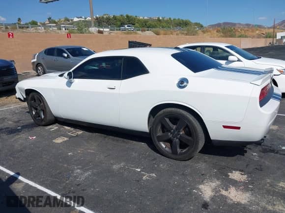 2013 Dodge Challenger SXT с VIN 2C3CDYAG0DH511936, выставлен на аукционе IAAI как лот 43316730 с пробегом 173 412 миль миль и . История ставок и продаж доступна на DreamBid. Изображение 15.
