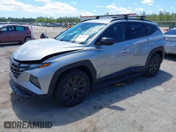 2023 Hyundai Tucson XRT with VIN KM8JFCAEXPU261133, listed as a IAAI auction lot 42270010 with 34,709 mi miles and . Bid and sale history available at DreamBid. Image 2.