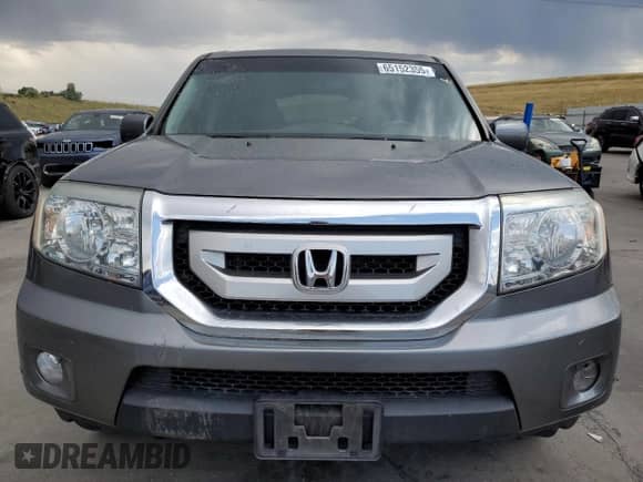 2009 Honda Pilot Touring with VIN 5FNYF48829B014693, listed as a Copart auction lot 65152355 with 160,961 mi miles and Salvage title. Bid and sale history available at DreamBid. Image 5.