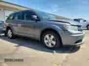 2013 Dodge Journey Canada Value with VIN 3C4PDCAB9DT595167, listed as a Copart auction lot 62157235 with 173,941 mi miles and Salvage title. Bid and sale history available at DreamBid. Image 4.