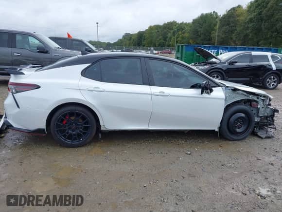 2023 Toyota Camry TRD with VIN 4T1KZ1AKXPU082161, listed as a IAAI auction lot 43388188 with 42,868 mi miles and . Bid and sale history available at DreamBid. Image 14.