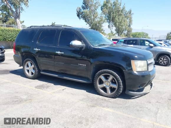 2009 Chevrolet Tahoe 2LT with VIN 1GNFC23059R295332, listed as a IAAI auction lot 42679966 with 223,678 mi miles and . Bid and sale history available at DreamBid. Image 1.