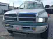 1999 Dodge 2500 with VIN 3B7KF2366XG125237, listed as a IAAI auction lot 43425983 with 286,284 mi miles and . Bid and sale history available at DreamBid. Image 6.