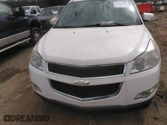 2012 Chevrolet Traverse 1LT z VIN 1GNKRGED2CJ131357, wystawiony jako IAAI lot #43381666 z przebiegiem 169 999 mil mil oraz . Historia ofert i sprzedaży dostępna na DreamBid. Obrazek 6.