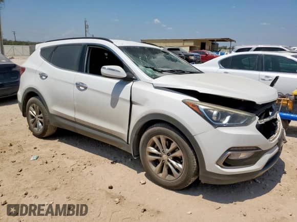 2018 Hyundai Santa Fe 2.0T with VIN 5NMZU4LA6JH075536, listed as a Copart auction lot 69057095 with 52,348 mi miles and Salvage title. Bid and sale history available at DreamBid. Image 4.