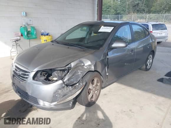 2010 Hyundai Elantra GLS z VIN KMHDU4AD1AU163017, wystawiony jako IAAI lot #43189615 z przebiegiem 177 100 mil mil oraz . Historia ofert i sprzedaży dostępna na DreamBid. Obrazek 17.