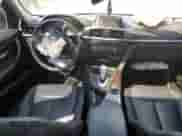 2013 BMW 3 Series 328i xDrive with VIN WBA3B3C50DF542473, listed as a Copart auction lot 69501165 with 136,590 mi miles and Salvage title. Bid and sale history available at DreamBid. Image 8.