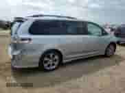 2014 Toyota Sienna SE with VIN 5TDXK3DC0ES412437, listed as a Copart auction lot 70558525 with 145,488 mi miles and Salvage title. Bid and sale history available at DreamBid. Image 3.