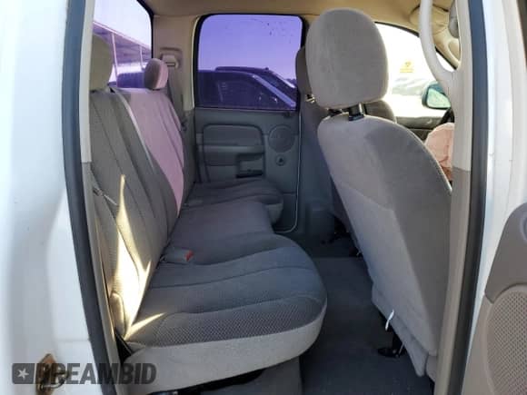 2004 Dodge 1500 SLT z VIN 1D7HA18N94S587630, wystawiony jako Copart lot #90291285 z przebiegiem Nie podano mil oraz Szkoda całkowita • Salvage title. Historia ofert i sprzedaży dostępna na DreamBid. Obrazek 10.