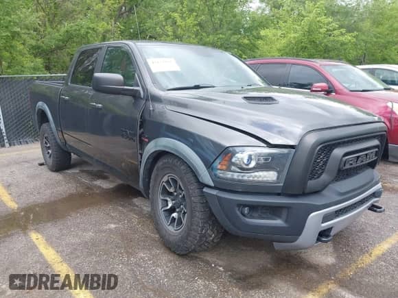 2015 Ram 1500 Rebel with VIN 1C6RR7YTXFS785507, listed as a IAAI auction lot 42172925 with 100,201 mi miles and . Bid and sale history available at DreamBid. Image 1.