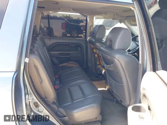 2006 Honda Pilot EX-L z VIN 5FNYF28516B017431, wystawiony jako IAAI lot #43133905 z przebiegiem 199 977 mil mil oraz . Historia ofert i sprzedaży dostępna na DreamBid. Obrazek 8.