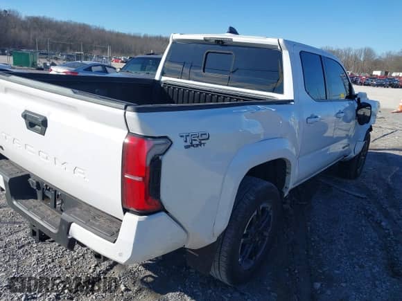 2024 Toyota Tacoma SR5 with VIN 3TMLB5JN1RM022825, listed as a IAAI auction lot 41356038 with 3,977 mi miles and . Bid and sale history available at DreamBid. Image 4.