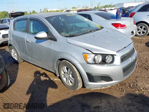 2012 Chevrolet Sonic LT with VIN 1G1JC6SH9C4117373, listed as a IAAI auction lot 43326034 with 104,249 mi miles and . Bid and sale history available at DreamBid. Image 1.