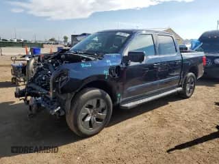 2023 Ford F-150 Lightning Pro with VIN 1FTVW1EL9PWG29776, listed as a Copart auction lot 70807935 with 39,701 mi miles and Salvage title. Bid and sale history available at DreamBid. Image 1.