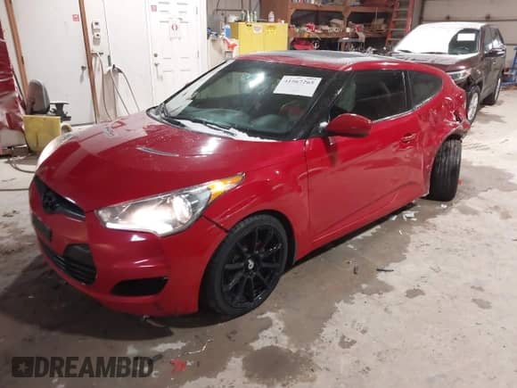 2012 Hyundai Veloster w/Black Int с VIN KMHTC6AD8CU032759, выставлен на аукционе IAAI как лот 41567265 с пробегом 156 973 миль миль и . История ставок и продаж доступна на DreamBid. Изображение 17.