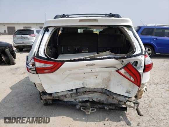 2016 Toyota Sienna LE with VIN 5TDJK3DC5GS134188, listed as a Copart auction lot 59168125 with 111,471 mi miles and Salvage title. Bid and sale history available at DreamBid. Image 6.