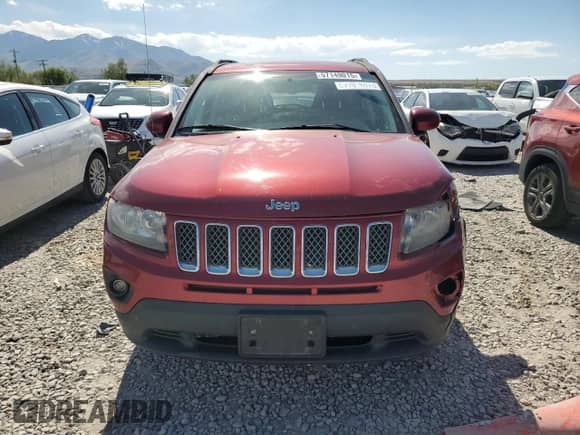 2015 Jeep Compass Latitude with VIN 1C4NJCEB5FD397611, listed as a Copart auction lot 57149015 with 130,292 mi miles and Salvage title. Bid and sale history available at DreamBid. Image 5.