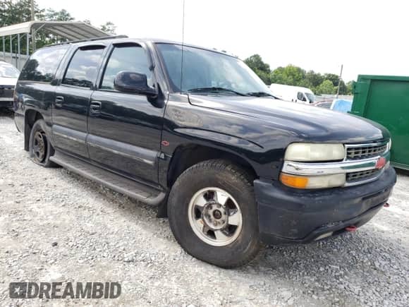 2003 Chevrolet Suburban LS z VIN 1GNFK16Z93J286162, wystawiony jako Copart lot #60956865 z przebiegiem 198 244 mil mil oraz Nie do naprawy • Non repairable. Historia ofert i sprzedaży dostępna na DreamBid. Obrazek 4.
