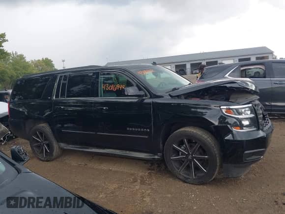 2015 Chevrolet Suburban LT с VIN 1GNSKJKC9FR306321, выставлен на аукционе IAAI как лот 43016948 с пробегом 152 683 миль миль и . История ставок и продаж доступна на DreamBid. Изображение 13.