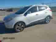 2014 Hyundai Tucson Limited z VIN KM8JU3AG3EU890012, wystawiony jako IAAI lot #43577338 z przebiegiem 127 044 mil mil oraz . Historia ofert i sprzedaży dostępna na DreamBid. Obrazek 2.