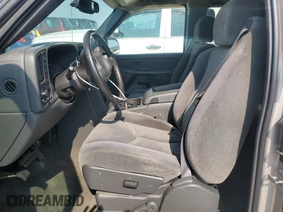 2005 Chevrolet Silverado 1500 Work Truck with VIN 1GCEK19V25Z326535, listed as a Copart auction lot 58144125 with 218,351 mi miles and Clean title. Bid and sale history available at DreamBid. Image 7.