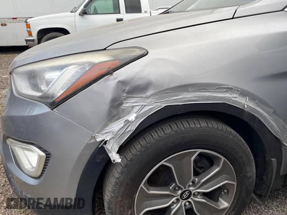 2015 Hyundai Santa Fe GLS with VIN KM8SM4HF4FU088867, listed as a IAAI auction lot 41725425 with 283,301 mi miles and . Bid and sale history available at DreamBid. Image 12.