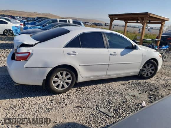 2009 Toyota Camry LE with VIN 4T1BK46K69U583632, listed as a Copart auction lot 71267705 with 107,208 mi miles and Salvage title. Bid and sale history available at DreamBid. Image 3.