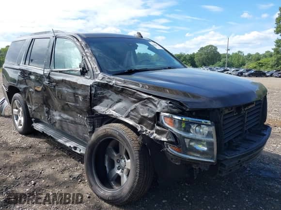 2018 Chevrolet Tahoe LT with VIN 1GNSKBKC4JR156035, listed as a IAAI auction lot 43009937 with 152,555 mi miles and . Bid and sale history available at DreamBid. Image 1.
