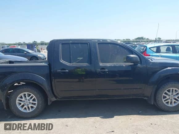 2018 Nissan Frontier SV with VIN 1N6DD0ER6JN701415, listed as a IAAI auction lot 43145718 with 164,798 mi miles and . Bid and sale history available at DreamBid. Image 13.