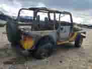 2000 Jeep Wrangler SE with VIN 1J4FA29P9YP787126, listed as a Copart auction lot 69889405 with Not provided miles and Non repairable. Bid and sale history available at DreamBid. Image 3.