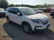 2021 Honda Pilot EX with VIN 5FNYF5H31MB041452, listed as a Copart auction lot 65549635 with 79,531 mi miles and Salvage title. Bid and sale history available at DreamBid. Image 4.